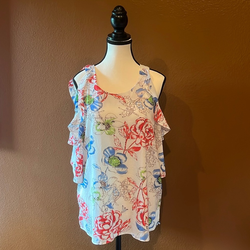 Beautiful multi colored floral blouse by Umgee